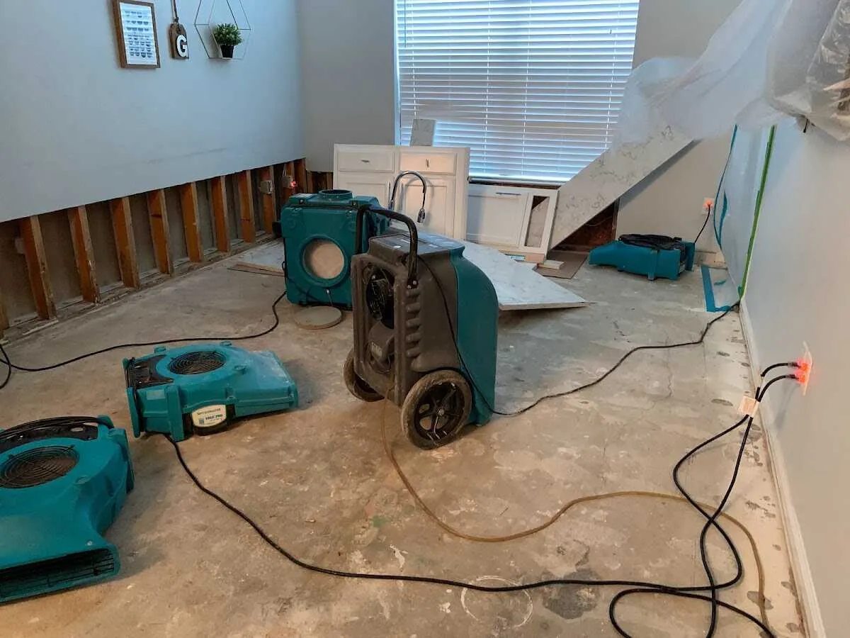 Dehumidifier in flood-cut room for Water Damage Restoration in Greenwood Village
